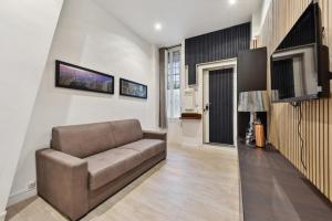 Televízia a/alebo spoločenská miestnosť v ubytovaní 269 Suite Pereire - Superb apartment in Paris