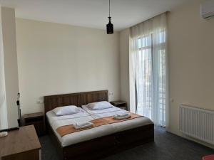 Postel nebo postele na pokoji v ubytování Guest House Nikola