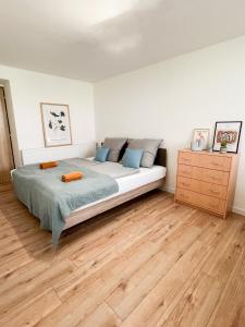 A bed or beds in a room at Nadštandardný apartmán s terasou