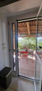 an open door to a patio with a picnic table at Salera Alta in Castagnole Lanze