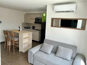 Posedenie v ubytovaní Apartamento en Zima con aire acondicionado