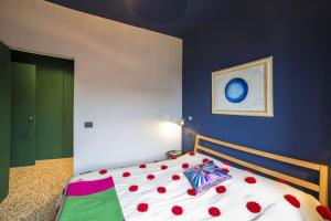 Postel nebo postele na pokoji v ubytování Ca' dei Colori design apartment