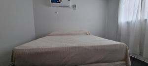 Una cama o camas en una habitación de ParSur alquileres temporales Catamarca