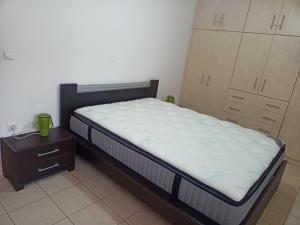 Postel nebo postele na pokoji v ubytování ΚΟΡΩΝΙΔΑ