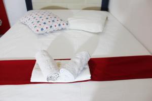 Postel nebo postele na pokoji v ubytování Hotel Erisun