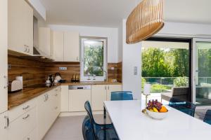 Kuchyň nebo kuchyňský kout v ubytování Blue4 Apartment
