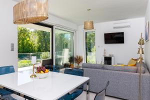 TV a/nebo společenská místnost v ubytování Blue4 Apartment