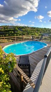 The swimming pool at or close to Casa do Olival - Andar Moradia T4