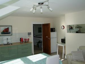 a kitchen with a sink and a counter top at Glendalough 10 Minutes from Beautiful Farmhouse in Roundwood