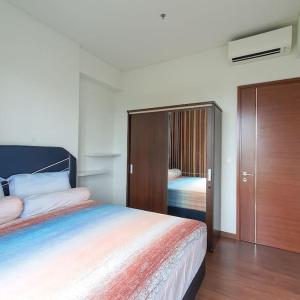 Voodi või voodid majutusasutuse Homey 1BR Condo Marigold Navapark BSD Full Furnish toas +19 fotot