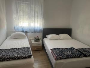 Apartmani Žuti客房内的一张或多张床位