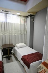 Postel nebo postele na pokoji v ubytování Hotel Hostel Bonito