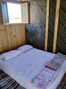 Postel nebo postele na pokoji v ubytování Sea sound Camp