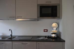 Kuchyň nebo kuchyňský kout v ubytování Holiday Home Giaron