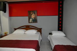 Postel nebo postele na pokoji v ubytování Hotel Hostel Bonito