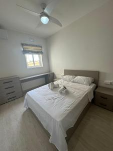 Postel nebo postele na pokoji v ubytování Victoria Modern Apartment + 12 fotografií