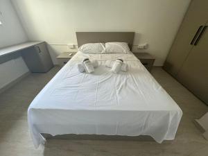 Postel nebo postele na pokoji v ubytování Victoria Modern Apartment