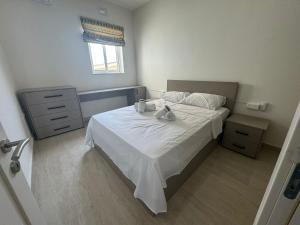 Postel nebo postele na pokoji v ubytování Victoria Modern Apartment