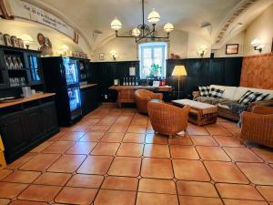Posezení v ubytování A8 Hotel im Darchinger Hof Bed & Breakfast - Zwischen Holzkirchen und Weyarn - Zwischen München Salzburg und Innsbruck - Kurz vor dem Irschenberg