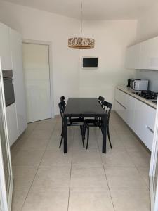 Η κουζίνα ή μικρή κουζίνα στο Come a Casa +21 φωτογραφίες