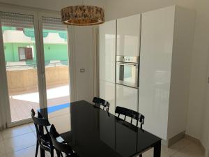 Η κουζίνα ή μικρή κουζίνα στο Come a Casa
