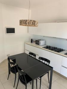 Η κουζίνα ή μικρή κουζίνα στο Come a Casa
