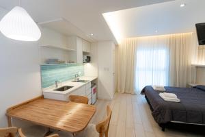 Postel nebo postele na pokoji v ubytování Hotel Nova