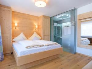 Voodi või voodid majutusasutuse Hotel Alpenblick toas