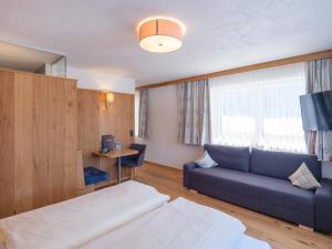 Voodi või voodid majutusasutuse Hotel Alpenblick toas