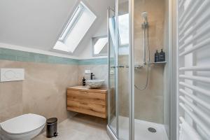Phòng tắm tại NAMASTÉ Homes - Ferienwohnung mit Dachterrasse