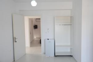 Kuchyň nebo kuchyňský kout v ubytování Ida Apartments