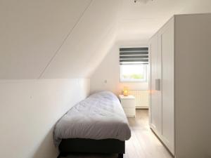 En eller flere senge i et værelse på Rustpunt Isola