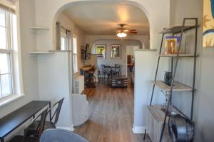 a living room with an archway in a house at Buffalo Lodge Bicycle Resort - Amazing access to local trails & the Garden in Colorado Springs