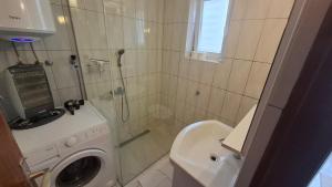 Ванная комната в Apartment Ajdukovic +15 фотографий