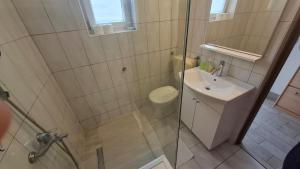 Ванная комната в Apartment Ajdukovic