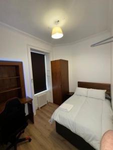 Postel nebo postele na pokoji v ubytování Cosy Double Room