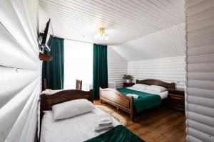 Letto o letti in una camera di Villa Anet