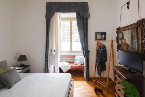 Μια τηλεόραση ή/και κέντρο ψυχαγωγίας στο B&B Ibiscus