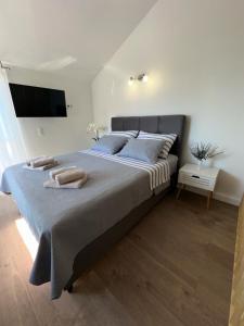 Postel nebo postele na pokoji v ubytování Apartment Lanterna