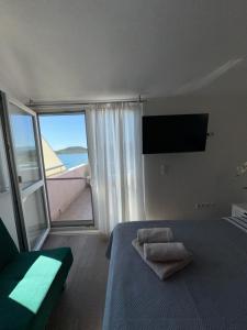 Postel nebo postele na pokoji v ubytování Apartment Lanterna