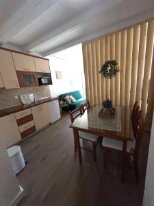 Kuchyň nebo kuchyňský kout v ubytování Apartment Lanterna