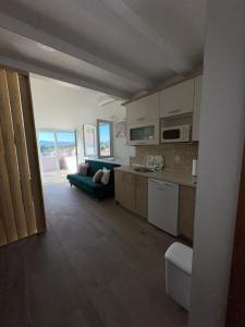 Kuchyň nebo kuchyňský kout v ubytování Apartment Lanterna