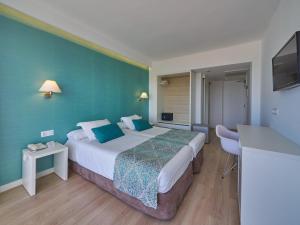 Postel nebo postele na pokoji v ubytování BQ Apolo Hotel