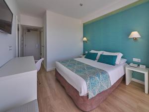 Postel nebo postele na pokoji v ubytování BQ Apolo Hotel