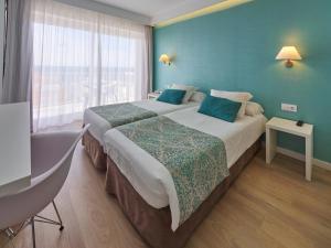 Postel nebo postele na pokoji v ubytování BQ Apolo Hotel