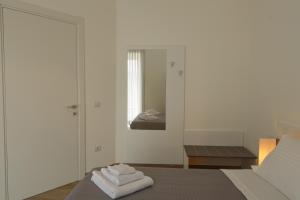 Postel nebo postele na pokoji v ubytování Fresia B&B