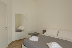 Postel nebo postele na pokoji v ubytování Fresia B&B