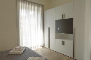 Postel nebo postele na pokoji v ubytování Fresia B&B