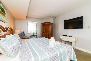 The Blue Dune Oceanfront Huge Balcony w Lazy River客房内的一张或多张床位