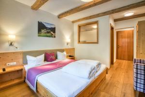 Letto o letti in una camera di Apart Fortuna
